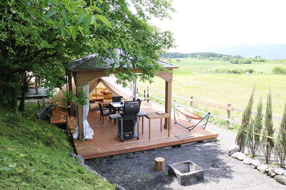 A gazebo with clear curtains for peace of mind on rainy days