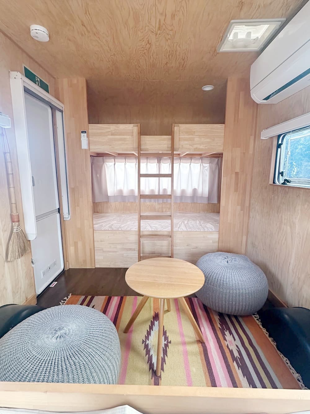 Bunk beds in a trailer house site at Urban Camping Asagiri Takarayama in Fujinomiya City, a campsite with a view of Mt. Fuji